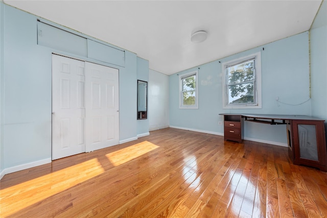 117-66 127th St, South Ozone Park, NY 11420 - unfurnished bedroom with light wood-type flooring and a closet