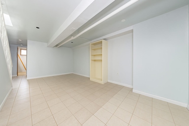 117-66 127th St, South Ozone Park, NY 11420 - basement with light tile patterned flooring and baseboards