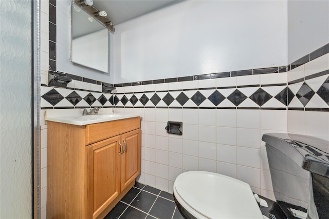 117-66 127th St, South Ozone Park, NY 11420 - bathroom with tile walls, vanity, and tile patterned flooring