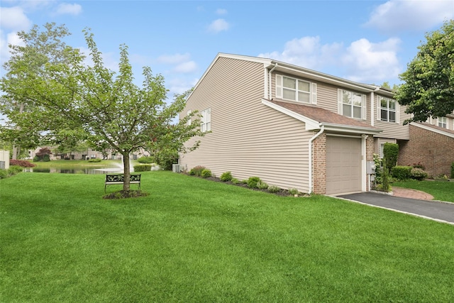 278 Pond View Ln, Smithtown, NY 11787 - view of side of property featuring a garage, asphalt driveway, brick siding, a yard, and a water view