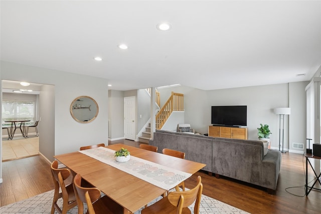 278 Pond View Ln, Smithtown, NY 11787 - dining area featuring wood finished floors, stairway, and recessed lighting