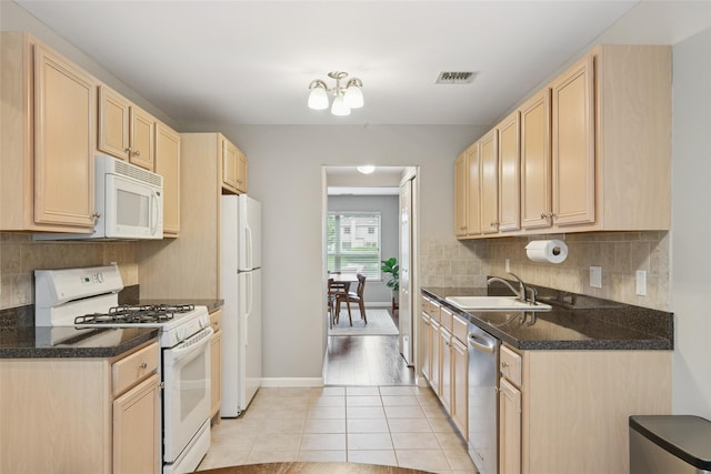 278 Pond View Ln, Smithtown, NY 11787 - kitchen featuring white appliances, light brown cabinetry, light tile patterned floors, and decorative backsplash