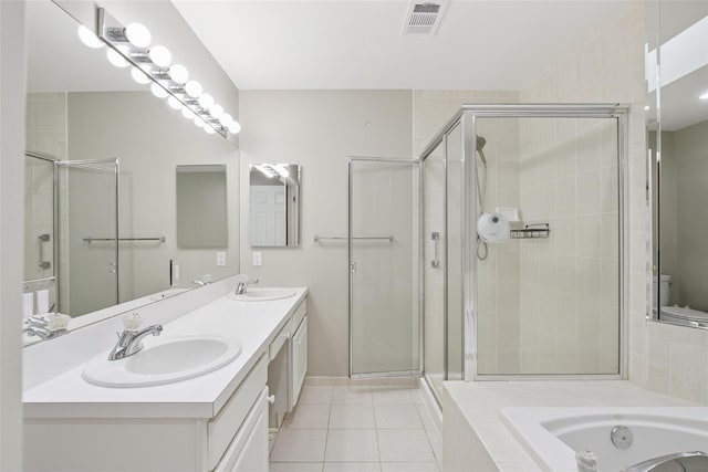 278 Pond View Ln, Smithtown, NY 11787 - full bath featuring double vanity, a garden tub, tile patterned flooring, and a shower stall
