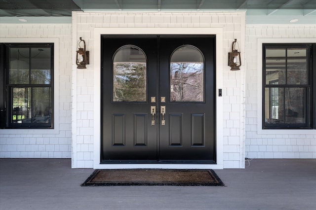 8 Maclean Dr, Pound Ridge, NY 10576 - doorway to property with french doors and covered porch