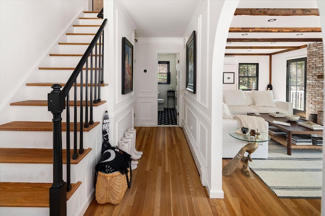 8 Maclean Dr, Pound Ridge, NY 10576 - hall with hardwood / wood-style flooring, stairs, an AC wall unit, a decorative wall, and recessed lighting