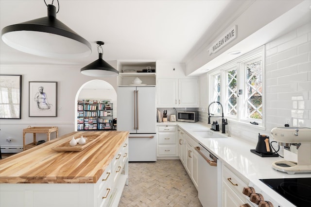 8 Maclean Dr, Pound Ridge, NY 10576 - kitchen with white appliances, wood counters, and white cabinets