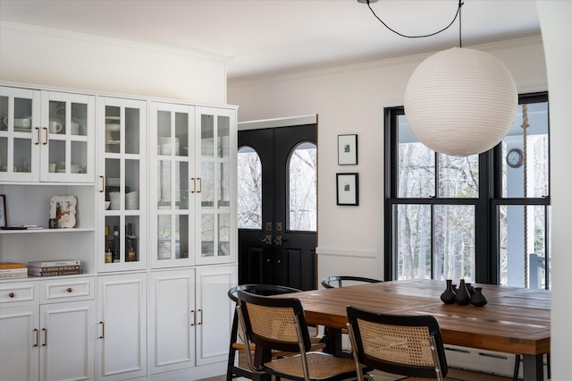 8 Maclean Dr, Pound Ridge, NY 10576 - dining space featuring plenty of natural light, ornamental molding, and french doors