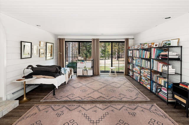 8 Maclean Dr, Pound Ridge, NY 10576 - sitting room featuring wood finished floors, wooden walls, and baseboard heating