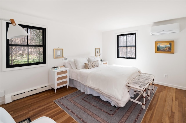 8 Maclean Dr, Pound Ridge, NY 10576 - bedroom with an AC wall unit, a baseboard heating unit, and wood finished floors