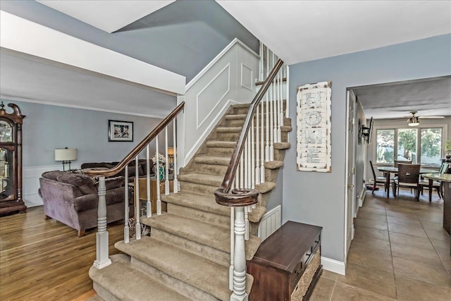7 Woodstock Pl, Lake Grove, NY 11755 - stairway featuring a ceiling fan and tile patterned floors