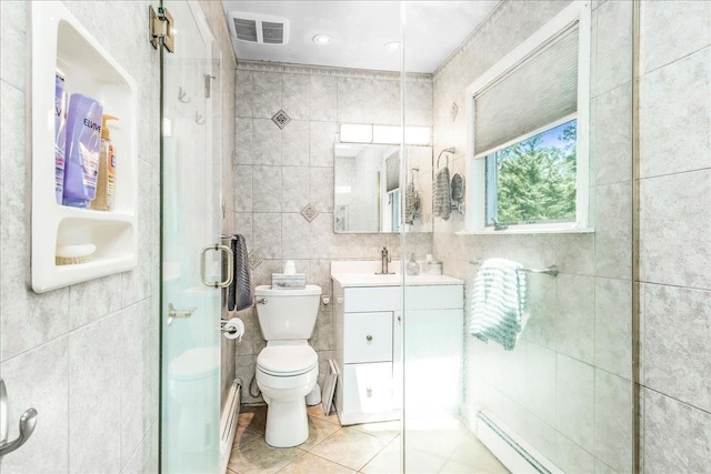 7 Woodstock Pl, Lake Grove, NY 11755 - bathroom featuring tile walls, tile patterned floors, vanity, a shower stall, and a baseboard radiator