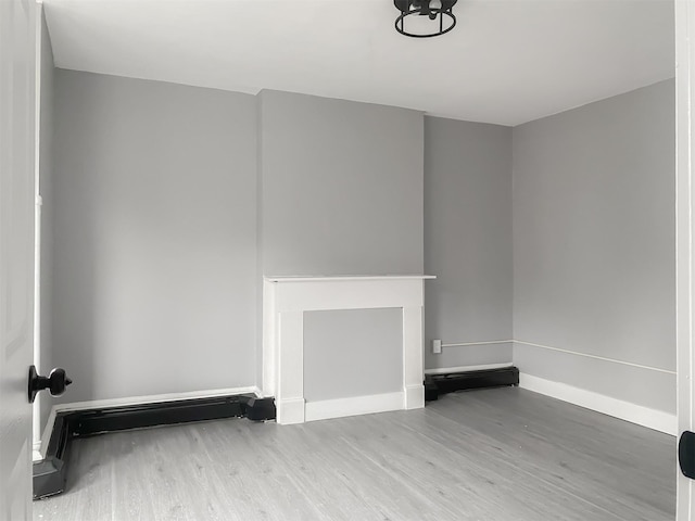 12 Liberty St, Newburgh, NY 12550 - unfurnished room featuring wood finished floors