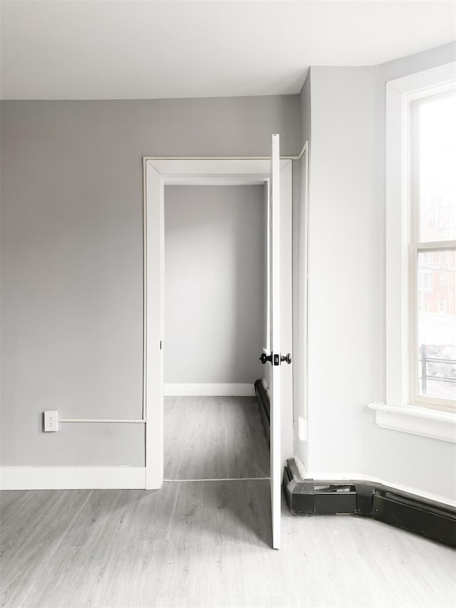 12 Liberty St, Newburgh, NY 12550 - closet with a baseboard heating unit