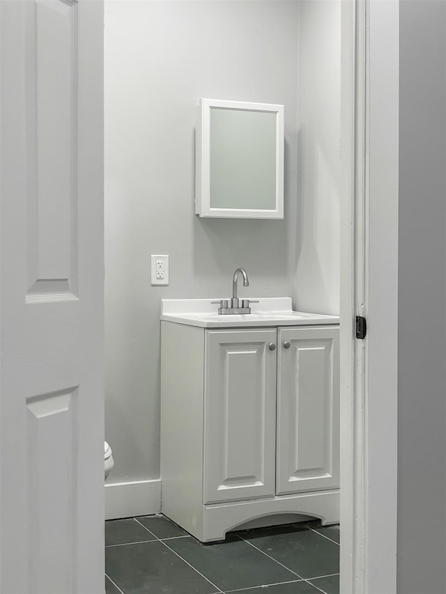 12 Liberty St, Newburgh, NY 12550 - half bath with tile patterned flooring and vanity
