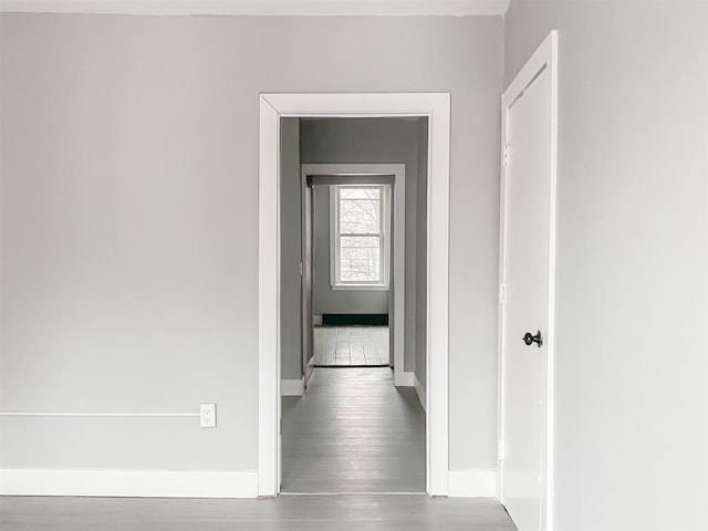 12 Liberty St, Newburgh, NY 12550 - corridor featuring baseboards and wood finished floors