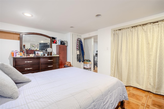 556 Long Beach Rd, Island Park, NY 11558 - tiled bedroom featuring recessed lighting