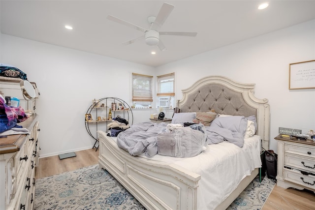 556 Long Beach Rd, Island Park, NY 11558 - bedroom with light wood-type flooring, recessed lighting, and ceiling fan