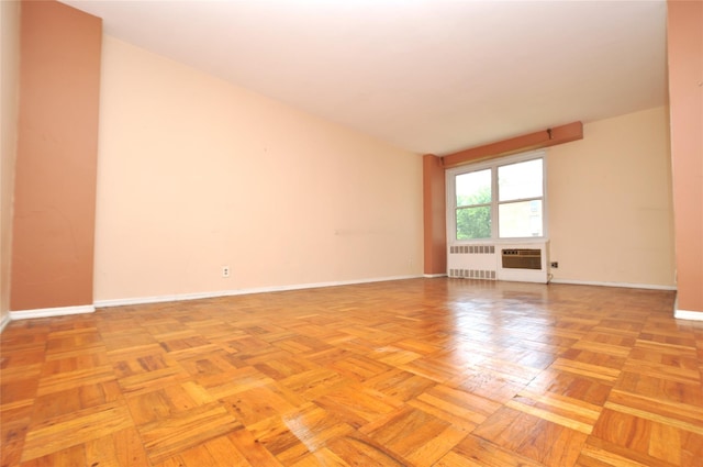 281 Garth Rd Unit B5D, Scarsdale, NY 10583 - spare room featuring radiator heating unit and baseboards