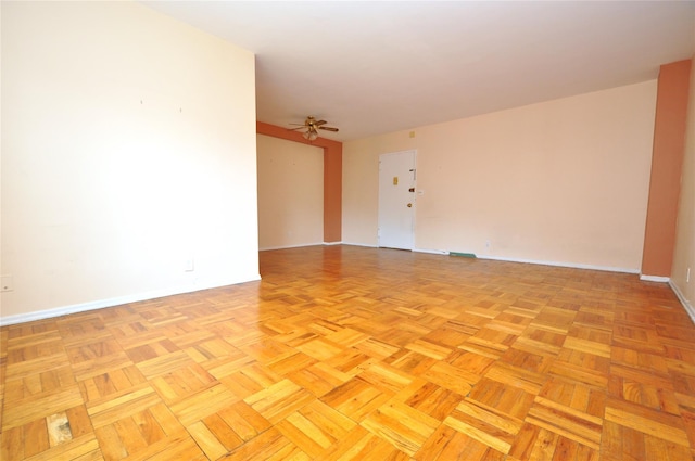 281 Garth Rd Unit B5D, Scarsdale, NY 10583 - unfurnished room with ceiling fan and baseboards