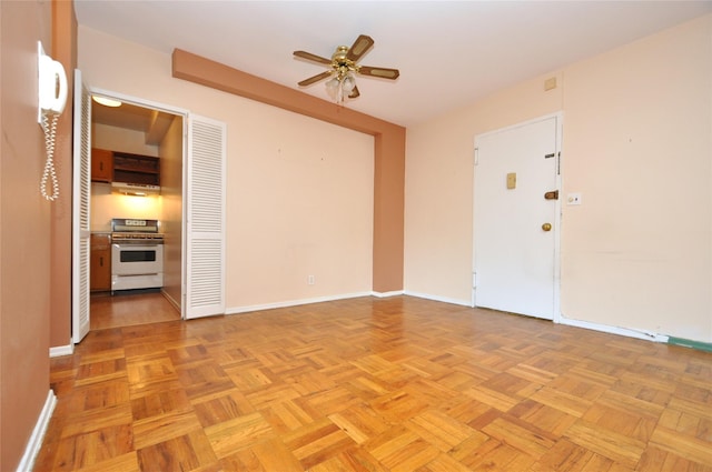281 Garth Rd Unit B5D, Scarsdale, NY 10583 - spare room with a ceiling fan and baseboards