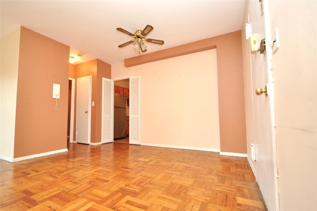 281 Garth Rd Unit B5D, Scarsdale, NY 10583 - spare room with baseboards and ceiling fan