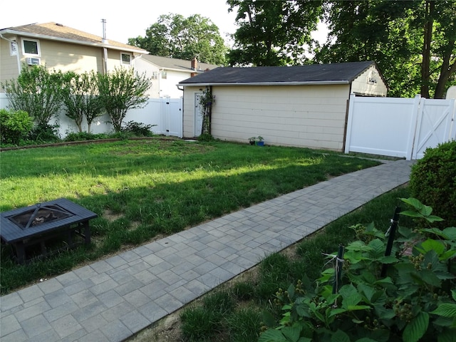 524 Polaris St, North Babylon, NY 11703 - fenced backyard with a gate and an outdoor fire pit