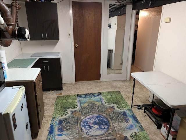 524 Polaris St, North Babylon, NY 11703 - kitchen with light countertops and dark cabinetry