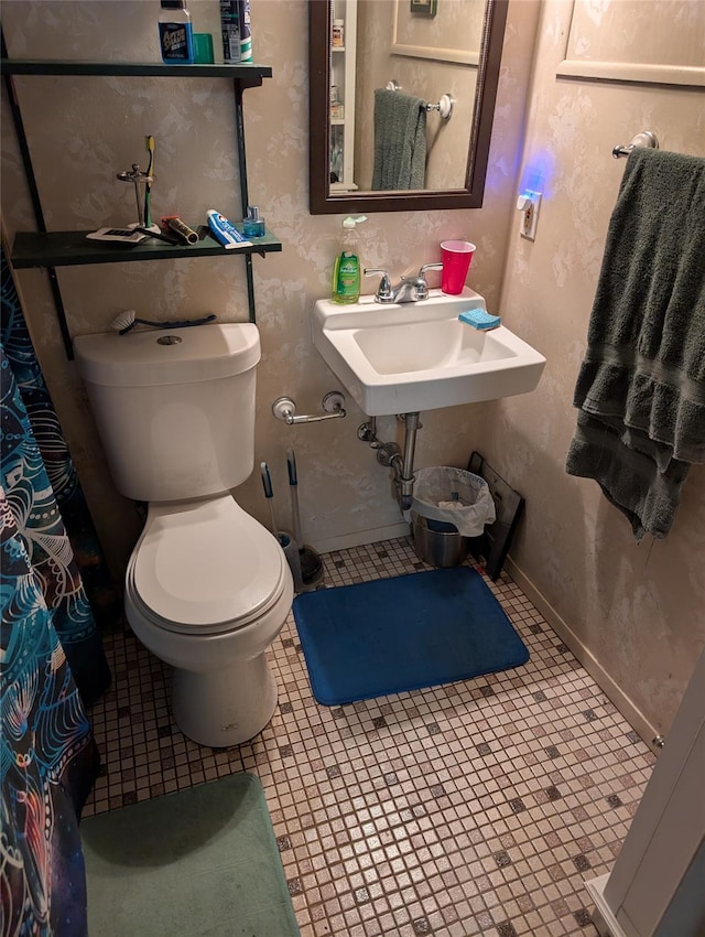 524 Polaris St, North Babylon, NY 11703 - bathroom featuring toilet and a sink