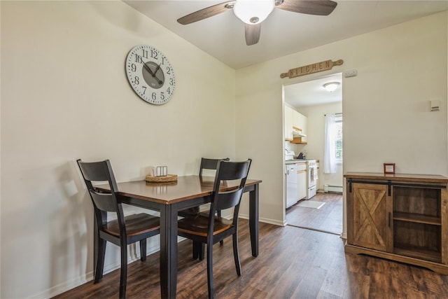 460 Old Town Rd Unit 8J, Port Jefferson Station, NY 11776 - dining area featuring dark wood-style flooring, a ceiling fan, and baseboard heating