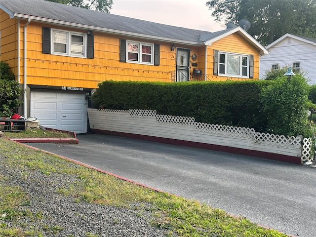 34 Harmony Rd, Spring Valley, NY 10977 - ranch-style home with driveway and a garage