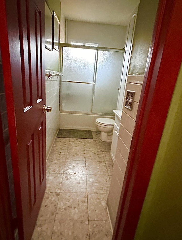 34 Harmony Rd, Spring Valley, NY 10977 - full bath with combined bath / shower with glass door and toilet