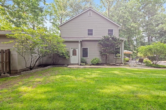 17 Dunmore Rd, New City, NY 10956 - rear view of house with a yard and a patio