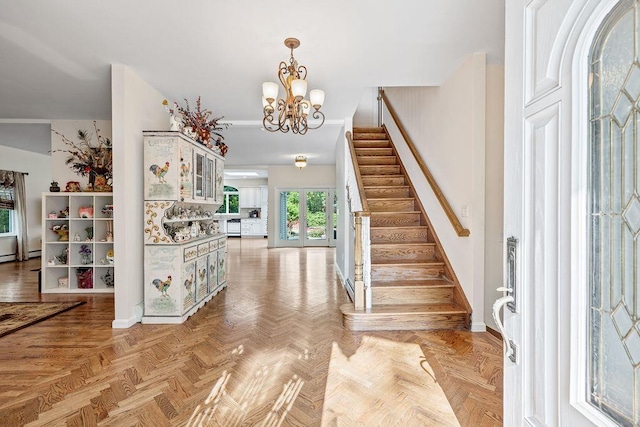 17 Dunmore Rd, New City, NY 10956 - entryway featuring stairway and a chandelier