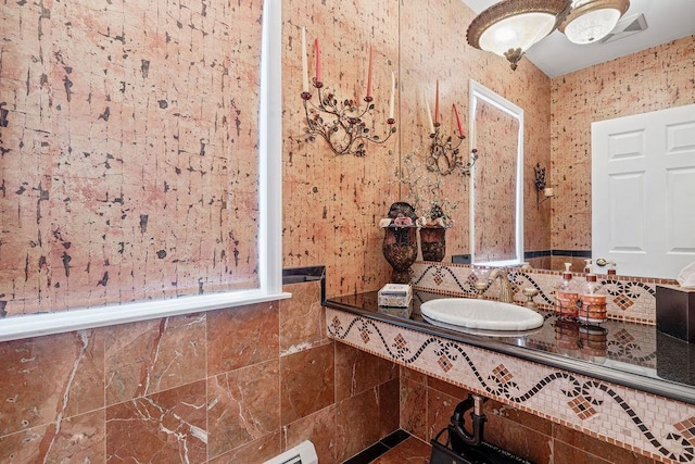 17 Dunmore Rd, New City, NY 10956 - bathroom with a sink and backsplash