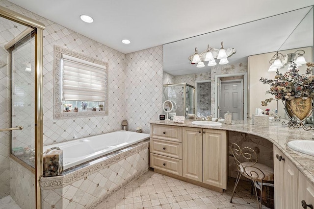 17 Dunmore Rd, New City, NY 10956 - bathroom featuring vanity, a garden tub, a stall shower, tile patterned floors, and wallpapered walls