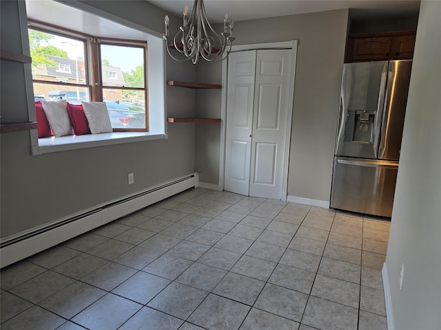 36 Hampton Ct, Middletown, NY 10941 - unfurnished dining area featuring a baseboard heating unit, light tile patterned flooring, and a chandelier