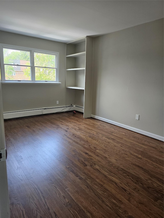 36 Hampton Ct, Middletown, NY 10941 - unfurnished room with a baseboard radiator and dark wood finished floors