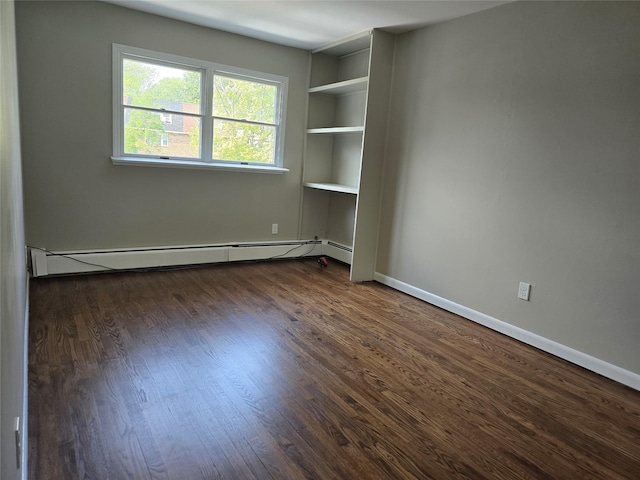 36 Hampton Ct, Middletown, NY 10941 - spare room with a baseboard radiator and dark wood-style floors