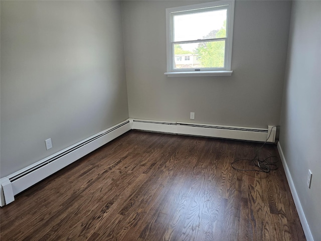 36 Hampton Ct, Middletown, NY 10941 - empty room featuring wood finished floors and a baseboard radiator