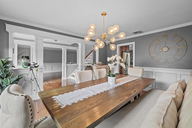 25 Bellwood Dr, New City, NY 10956 - dining room with a decorative wall, decorative columns, stairway, ornamental molding, and a chandelier