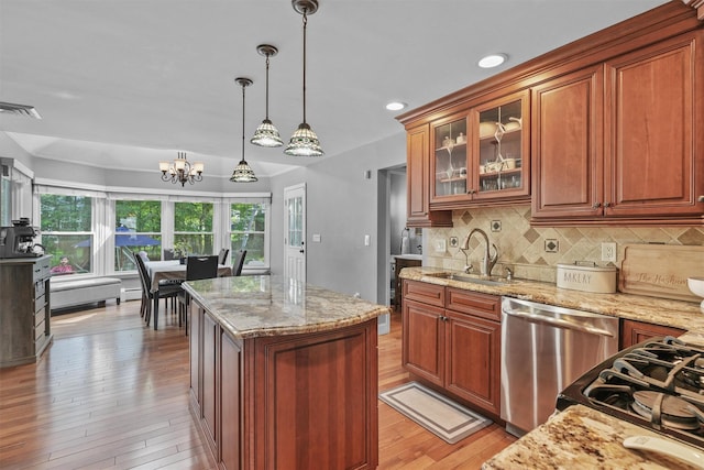 25 Bellwood Dr, New City, NY 10956 - kitchen with dishwasher, light wood-style flooring, light stone countertops, a chandelier, and recessed lighting