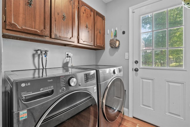 25 Bellwood Dr, New City, NY 10956 - laundry area with cabinet space, independent washer and dryer, and wood finished floors