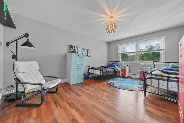 25 Bellwood Dr, New City, NY 10956 - bedroom with wood finished floors and baseboard heating