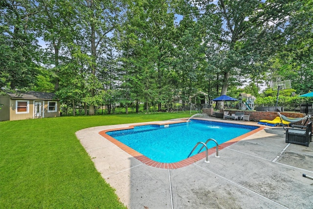 25 Bellwood Dr, New City, NY 10956 - view of swimming pool with a patio, an outdoor structure, and view of wooded area