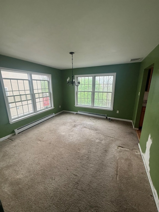 48 Patmore Ave, Yonkers, NY 10710 - spare room featuring baseboard heating, a chandelier, and carpet flooring