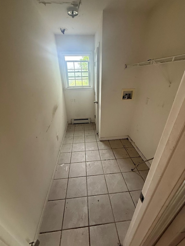 48 Patmore Ave, Yonkers, NY 10710 - laundry area featuring baseboard heating, light tile patterned floors, and washer hookup
