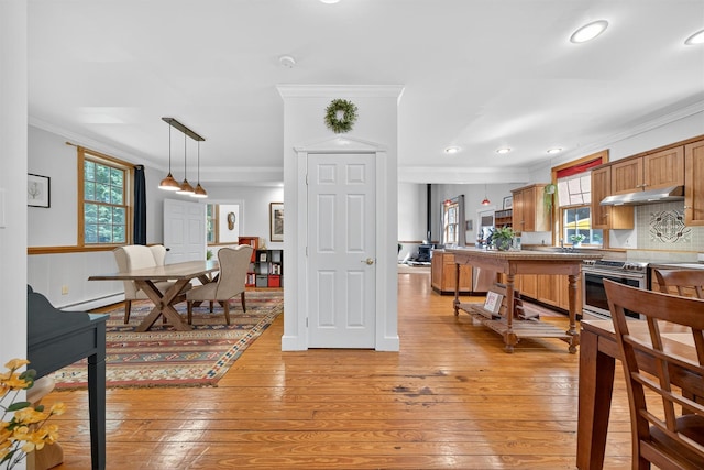 62 Guymard Tpke, Godeffroy, NY 12729 - dining space featuring light wood-style flooring, crown molding, recessed lighting, and a baseboard heating unit