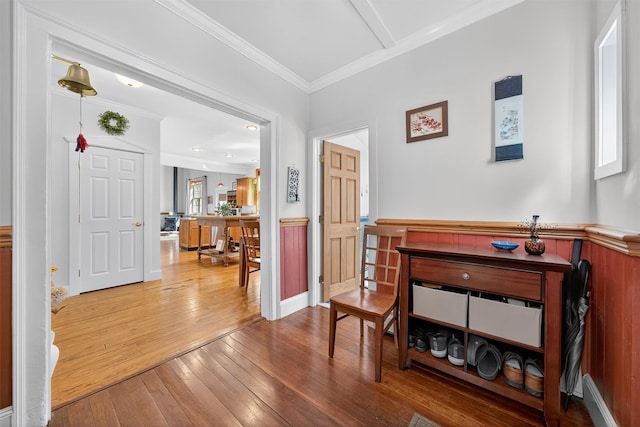 62 Guymard Tpke, Godeffroy, NY 12729 - hall with wood-type flooring, crown molding, and a wainscoted wall