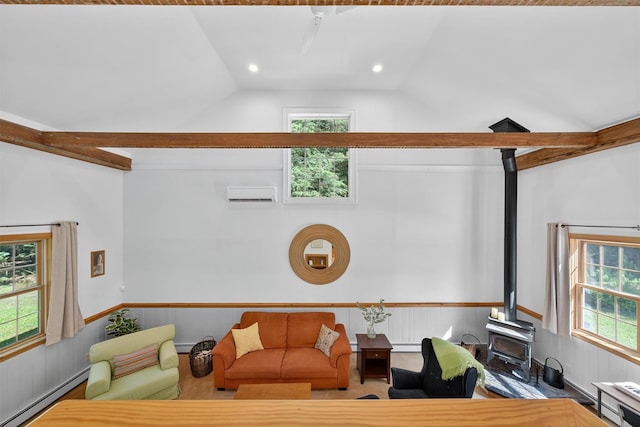 62 Guymard Tpke, Godeffroy, NY 12729 - living room with a baseboard heating unit, a wood stove, a wainscoted wall, lofted ceiling, and an AC wall unit