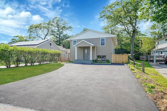 12 Bay Ave, Lake Ronkonkoma, NY 11779 - view of front facade featuring asphalt driveway
